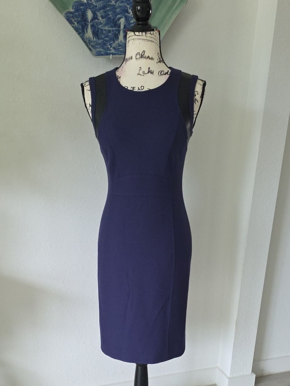 Hugo Boss Daleta dress features distinctive black leather-accented shoulders.